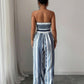 👗 47% OFF NOW! 💥 Geometric Jumpsuit with Halter Neckline & Side Slit – Unique print & elastic back – Versatile, perfect for summer parties or resort wear ✨